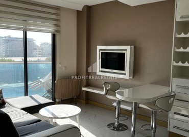 Ergonomic cozy furnished apartment 1+1, in a residence with extensive facilities, in the center of Alanya ID-16122 фото-3