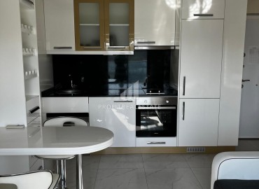 Ergonomic cozy furnished apartment 1+1, in a residence with extensive facilities, in the center of Alanya ID-16122 фото-4