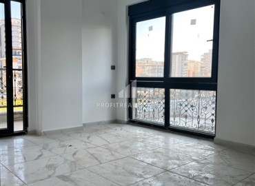 Двухкомнатная квартира с чистовой отделкой, 50м², в новом комплексе в центре Махмутлара, Алания ID-17679 фото-3