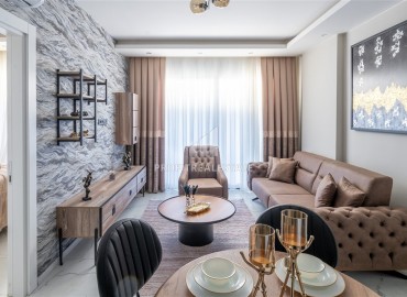 Апартаменты с одной спальней, 53м², в новостройке с отличной локацией в 200м от моря в районе Каргыджак, Алания ID-17700 фото-2