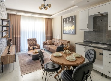 Апартаменты с одной спальней, 53м², в новостройке с отличной локацией в 200м от моря в районе Каргыджак, Алания ID-17700 фото-3