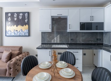 Апартаменты с одной спальней, 53м², в новостройке с отличной локацией в 200м от моря в районе Каргыджак, Алания ID-17700 фото-4