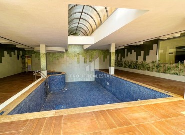 Укомплектованная двухкомнатная квартира, 70м², в уютном комплексе премиум класса в центре района Оба, Алания ID-17703 фото-11
