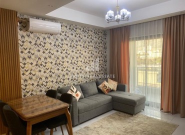 Готовая к проживанию, стильная квартира 1+1, 53м², в элитном комплексе у моря в Махмутларе, Алания ID-17718 фото-3