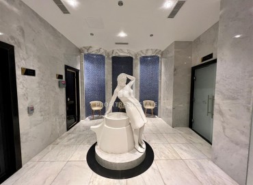 Готовая к проживанию, стильная квартира 1+1, 53м², в элитном комплексе у моря в Махмутларе, Алания ID-17718 фото-11