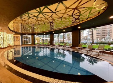 Готовая к проживанию, стильная квартира 1+1, 53м², в элитном комплексе у моря в Махмутларе, Алания ID-17718 фото-12