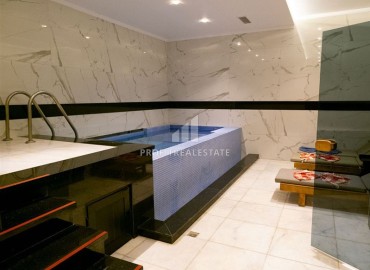 Готовая к проживанию, стильная квартира 1+1, 53м², в элитном комплексе у моря в Махмутларе, Алания ID-17718 фото-20