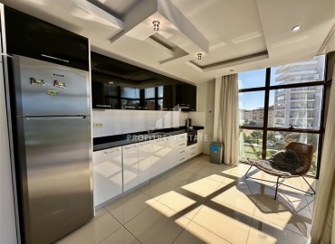 Элегантная квартира с одной спальней, 77м², в комплексе с отельной инфраструктурой в районе Джикджилли, Алания ID-17722 фото-4