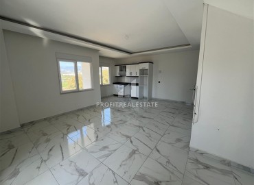 Трехкомнатный пентхаус, 125м², с видом на горы, в новостройке с зимним бассейном, в 700м от моря в Махмутларе, Алания ID-17723 фото-3