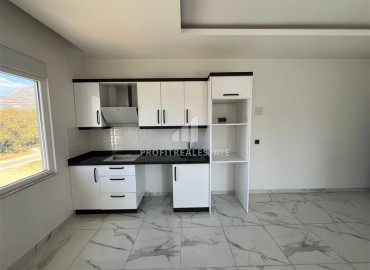 Трехкомнатный пентхаус, 125м², с видом на горы, в новостройке с зимним бассейном, в 700м от моря в Махмутларе, Алания ID-17723 фото-4