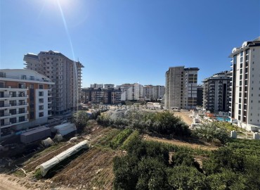 Трехкомнатный пентхаус, 125м², с видом на горы, в новостройке с зимним бассейном, в 700м от моря в Махмутларе, Алания ID-17723 фото-9