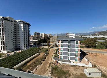 Трехкомнатный пентхаус, 125м², с видом на горы, в новостройке с зимним бассейном, в 700м от моря в Махмутларе, Алания ID-17723 фото-13