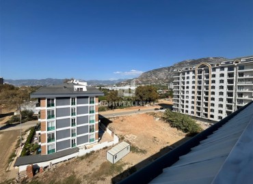 Трехкомнатный пентхаус, 125м², с видом на горы, в новостройке с зимним бассейном, в 700м от моря в Махмутларе, Алания ID-17723 фото-14