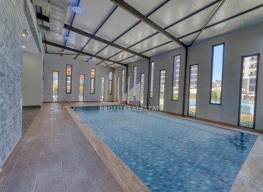 Меблированная трехкомнатная квартира, 85м², на высоком этаже в комплексе премиум класса в Махмутларе, Алания ID-17726 фото-20