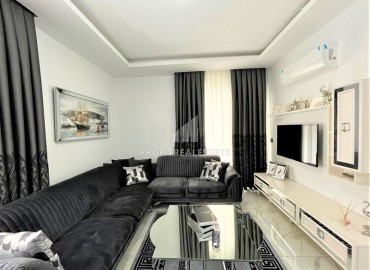 Дизайнерская двухкомнатная квартира, 55м², в новом комплексе с хорошей инфраструктурой в Махмутларе ID-17731 фото-2