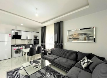 Дизайнерская двухкомнатная квартира, 55м², в новом комплексе с хорошей инфраструктурой в Махмутларе ID-17731 фото-3