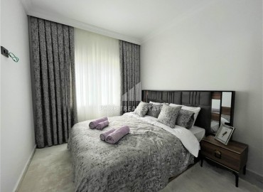 Дизайнерская двухкомнатная квартира, 55м², в новом комплексе с хорошей инфраструктурой в Махмутларе ID-17731 фото-7