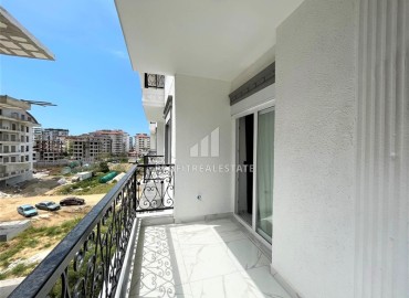 Дизайнерская двухкомнатная квартира, 55м², в новом комплексе с хорошей инфраструктурой в Махмутларе ID-17731 фото-10