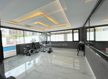 Дизайнерская двухкомнатная квартира, 55м², в новом комплексе с хорошей инфраструктурой в Махмутларе ID-17731 фото-13