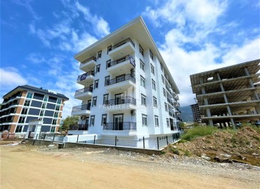 Дизайнерская двухкомнатная квартира, 55м², в новом комплексе с хорошей инфраструктурой в Махмутларе ID-17731 фото-16