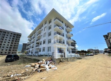 Дизайнерская двухкомнатная квартира, 55м², в новом комплексе с хорошей инфраструктурой в Махмутларе ID-17731 фото-18