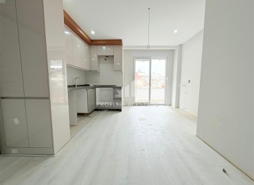 Супер предложение: двухкомнатная квартира, 60м² в новостройке с парковкой в Анталии, район Кепез, Февзи Чакмак ID-17737 фото-2