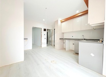 Супер предложение: двухкомнатная квартира, 60м² в новостройке с парковкой в Анталии, район Кепез, Февзи Чакмак ID-17737 фото-3