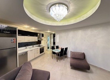Меблированная двухкомнатная квартира, 55м², с видом на море в элитном комплексе Махмулара, Алания ID-17742 фото-2