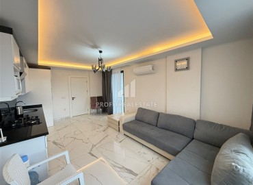Двухкомнатная квартира, 55м², с видом на горы в элитной новостройке Махмутлара, в 600м от моря, Алания ID-17747 фото-5