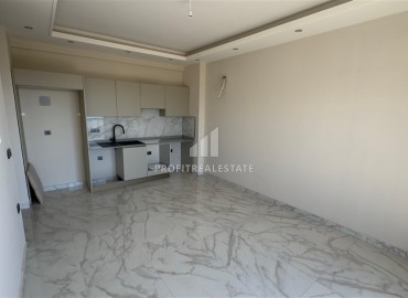 Видовые апартаменты 1+1, 50м², с отличной локацией в 150м от моря на центральной улице Каргыджака, Алания ID-17188 фото-2