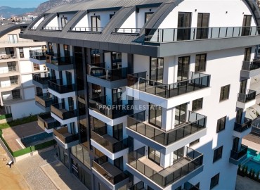 Видовые апартаменты 1+1, 50м², с отличной локацией в 150м от моря на центральной улице Каргыджака, Алания ID-17188 фото-15