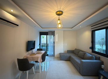 Двухкомнатная квартира, 50м², с выходом в сад в комплексе премиум класса в Каргыджаке, Алания, 700м от моря ID-17756 фото-2
