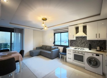 Двухкомнатная квартира, 50м², с выходом в сад в комплексе премиум класса в Каргыджаке, Алания, 700м от моря ID-17756 фото-3