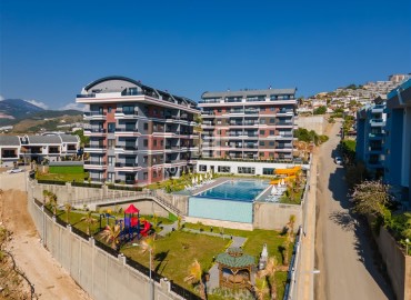 Двухкомнатная квартира, 50м², с выходом в сад в комплексе премиум класса в Каргыджаке, Алания, 700м от моря ID-17756 фото-11