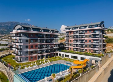 Двухкомнатная квартира, 50м², с выходом в сад в комплексе премиум класса в Каргыджаке, Алания, 700м от моря ID-17756 фото-12