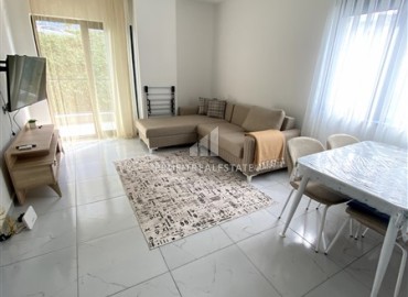Меблированная квартира с одной спальней, 56м², в новом комплексе с удачной локацией в Махмутларе, Алания ID-17758 фото-3