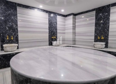 Меблированная квартира с одной спальней, 56м², в новом комплексе с удачной локацией в Махмутларе, Алания ID-17758 фото-15