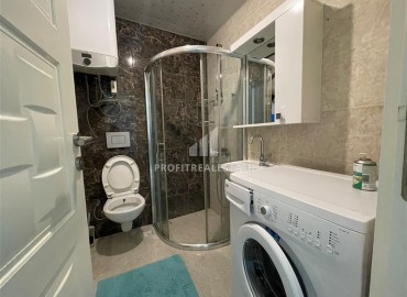 Готовая к проживанию, квартира 1+1, 60м², в комплексе с бассейном на центральной улице Махмутлара, Алания ID-17769 фото-10