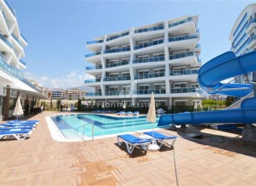 Furnished one-bedroom apartment 65m², in a residential residence with facilities, Oba, Alanya ID-16496 фото-1