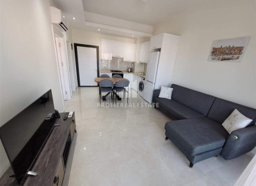 Симпатичная двухкомнатная квартира, 55м², в комплексе с зимним бассейном, в 1км от моря в Авсалларе, Алания ID-17777 фото-2