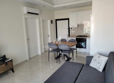 Симпатичная двухкомнатная квартира, 55м², в комплексе с зимним бассейном, в 1км от моря в Авсалларе, Алания ID-17777 фото-3