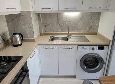 Симпатичная двухкомнатная квартира, 55м², в комплексе с зимним бассейном, в 1км от моря в Авсалларе, Алания ID-17777 фото-7