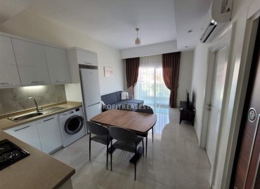 Симпатичная двухкомнатная квартира, 55м², в комплексе с зимним бассейном, в 1км от моря в Авсалларе, Алания ID-17777 фото-9