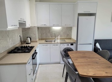 Симпатичная двухкомнатная квартира, 55м², в комплексе с зимним бассейном, в 1км от моря в Авсалларе, Алания ID-17777 фото-10