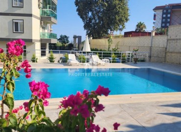Симпатичная двухкомнатная квартира, 55м², в комплексе с зимним бассейном, в 1км от моря в Авсалларе, Алания ID-17777 фото-15