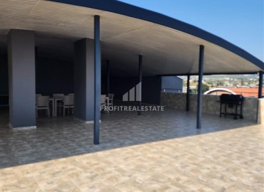 Симпатичная двухкомнатная квартира, 55м², в комплексе с зимним бассейном, в 1км от моря в Авсалларе, Алания ID-17777 фото-18