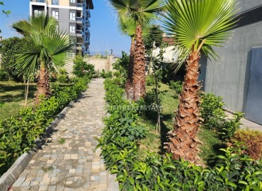 Симпатичная двухкомнатная квартира, 55м², в комплексе с зимним бассейном, в 1км от моря в Авсалларе, Алания ID-17777 фото-20