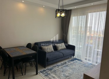 Стильная трехкомнатная квартира, 70м², в новом комплексе премиум класса в Махмутларе, Алания ID-17795 фото-2