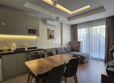 Отличное предложение: дизайнерская квартира с одной спальней, 60м², в комфортабельном комплексе у пляжа Клеопатры, Алания ID-17830 фото-4