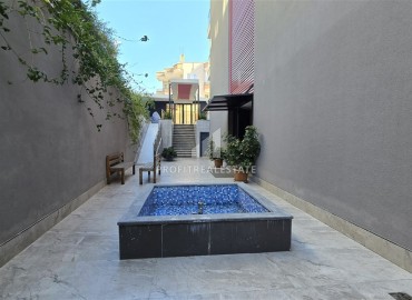 Отличное предложение: дизайнерская квартира с одной спальней, 60м², в комфортабельном комплексе у пляжа Клеопатры, Алания ID-17830 фото-13